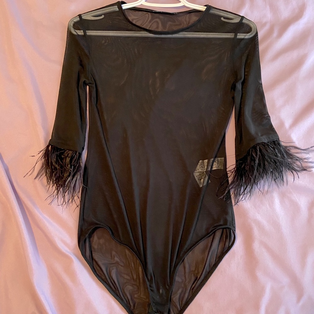 Sheer black bodysuit with feathers